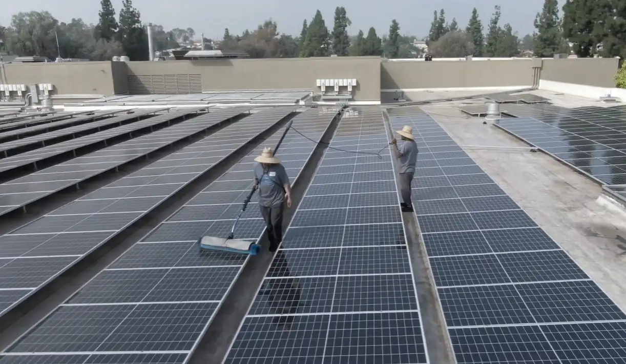 Large-scale solar panel array showing the scale of commercial solar panel cleaning services